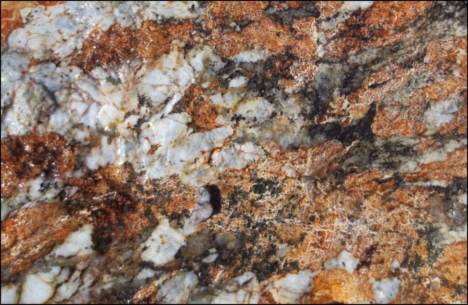 Lithium-bearing pegmatite rock treated to