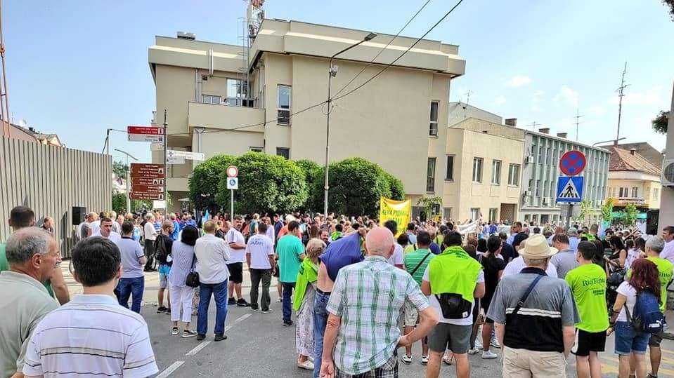 Anti-Government Chants And Brandished Posters